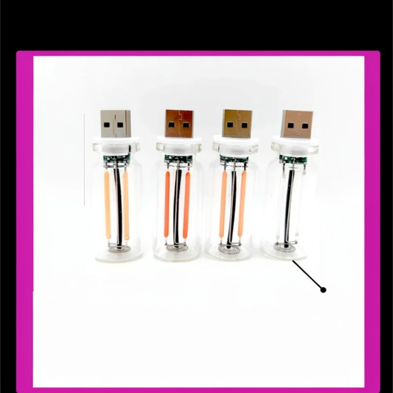 Drei USB-touchbare LED-Glühfaden-Nachtlichter in einem weißen Rahmen.