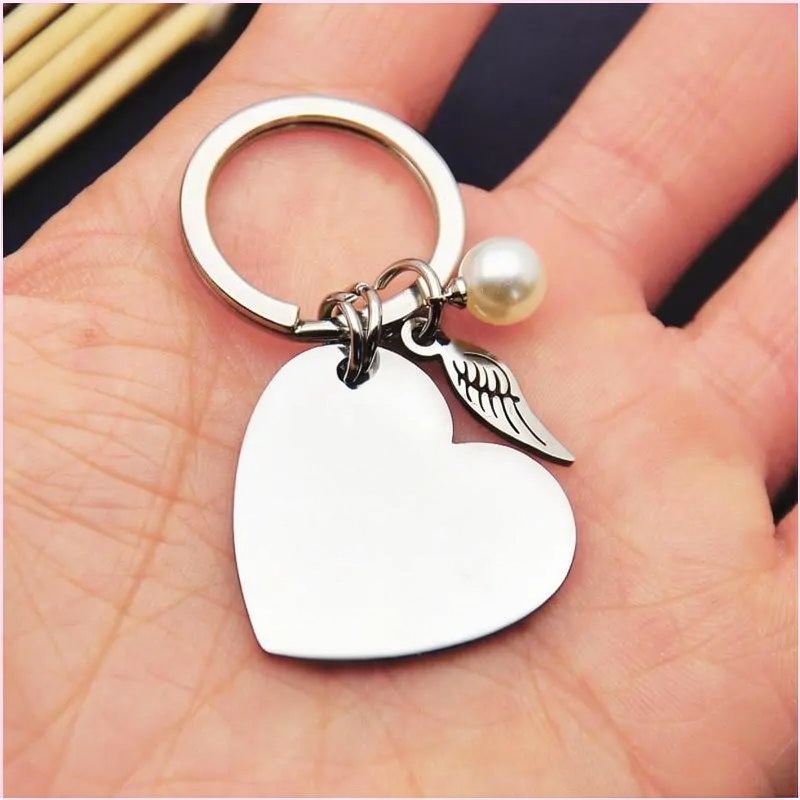 Porte-clés Sœur avec Perle et Pendentif Ailes