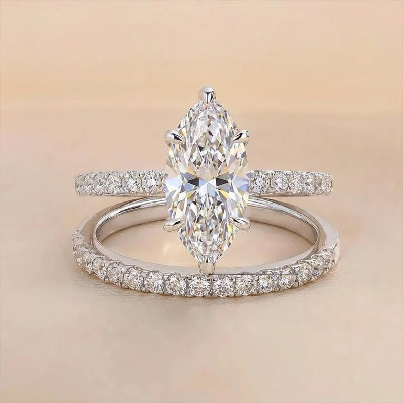 Bague en argent sterling marquise zircon avec pierre centrale et halo.