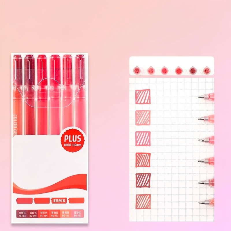 Un set de bolígrafos de gel acrílicos rojos junto a una hoja de papel cuadriculado para escribir.