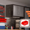 Wall-mounted red storage bins and tools organized on a dark gray wall panel.